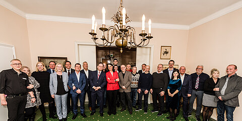 The honoured employees with their partners, the management and superiors
