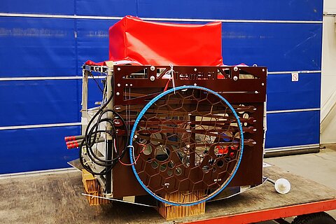 Gondola with coil and lowering device