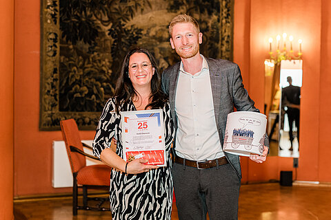 A celebrant and her laudator at the anniversary event.