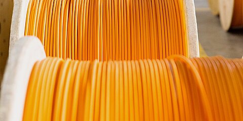 Cable drums with orange cables